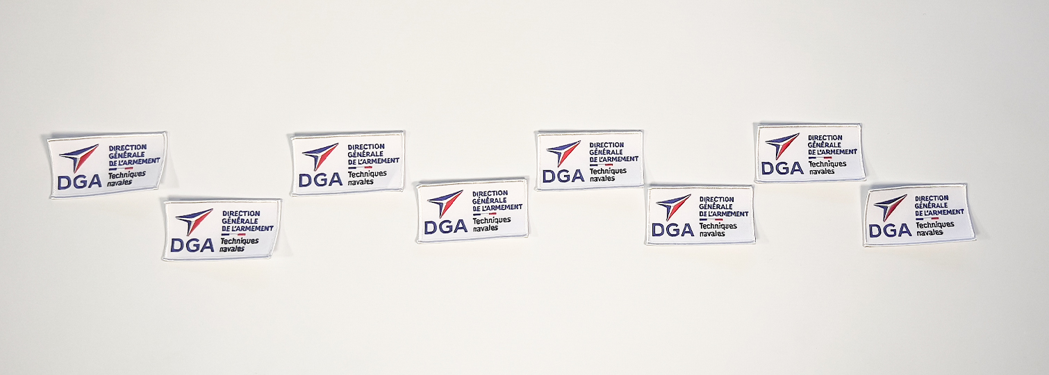 Kombination gestickter Abzeichen zum Aufnähen auf die Uniformen der Mitglieder der DGA.